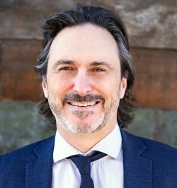 Chris MacDonald, scoring entries on the top-tier press judging panel in the 14th annual Best in Biz Awards business awards
