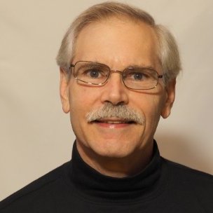 Fred Fishkin, scoring entries on the top-tier press judging panel in the 14th annual Best in Biz Awards business awards